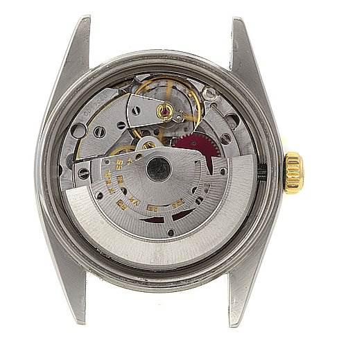 This image shows the back view of a Rolex Vintage Collection 16013 Men's Stainless Steel Blue Dial 16013 Men's Stainless Steel Blue Dial watch, highlighting its internal mechanical movement and parts.