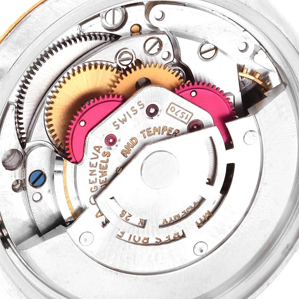 This image shows the intricate internal mechanism of the Vintage Collection Rolex watch.