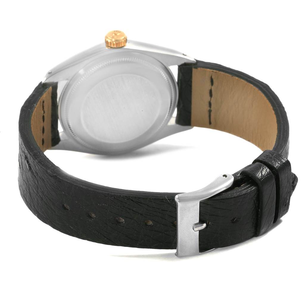 The image shows the back and side of a Rolex Vintage Collection 1501 Men's Steel and Gold (two tone) White Dial 1501 Men's Steel and Gold (two tone) White Dial watch, highlighting the leather strap and buckle.