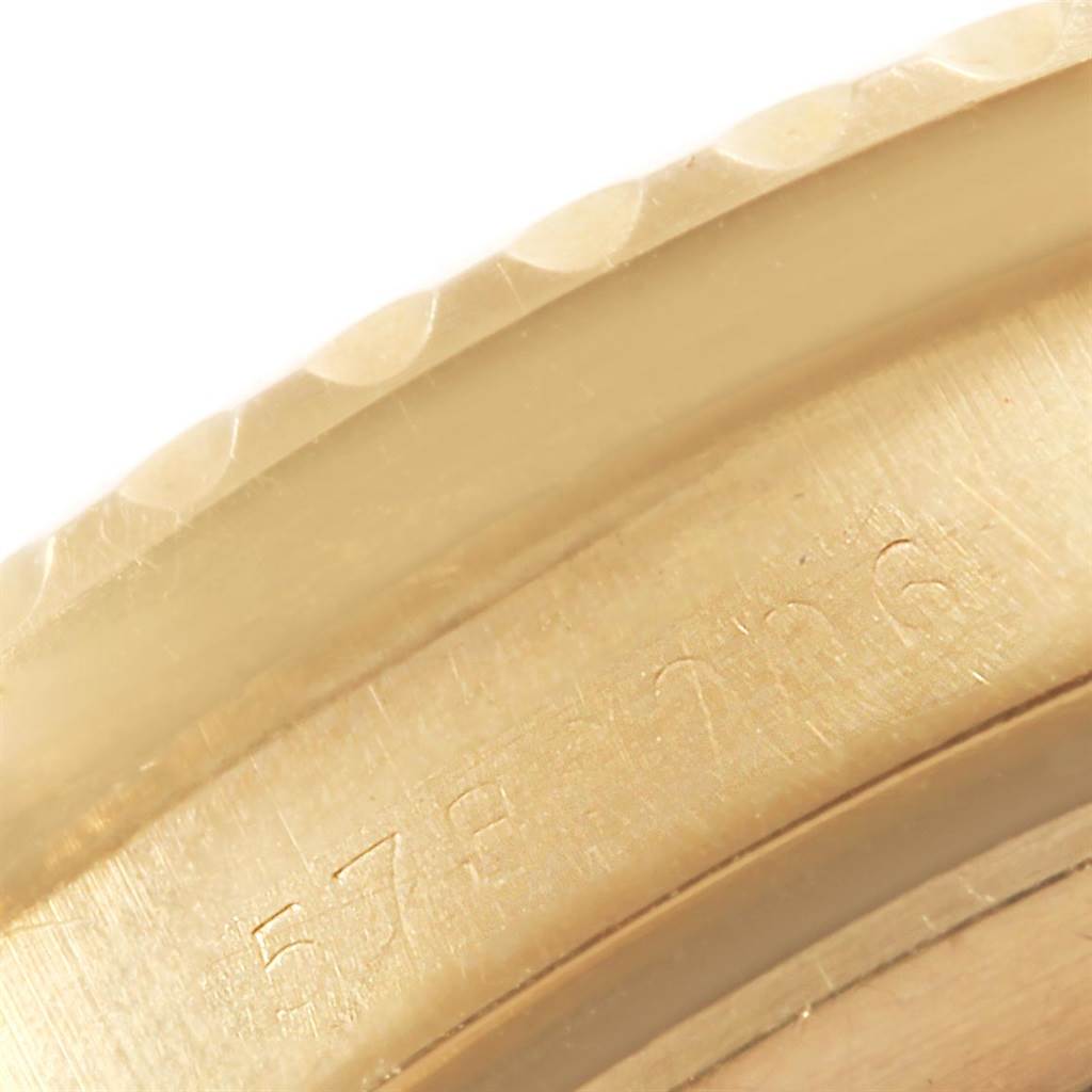 This image shows a close-up of the bezel and case-back of the Vintage Collection model by Rolex.