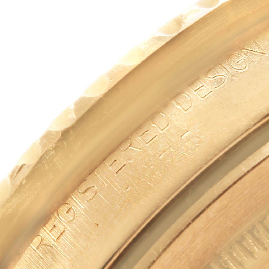 This image shows a close-up of the engraved caseback of the Rolex Vintage Collection 1675 Men's Yellow Gold Brown Dial 1675 Men's Yellow Gold Brown Dial watch.