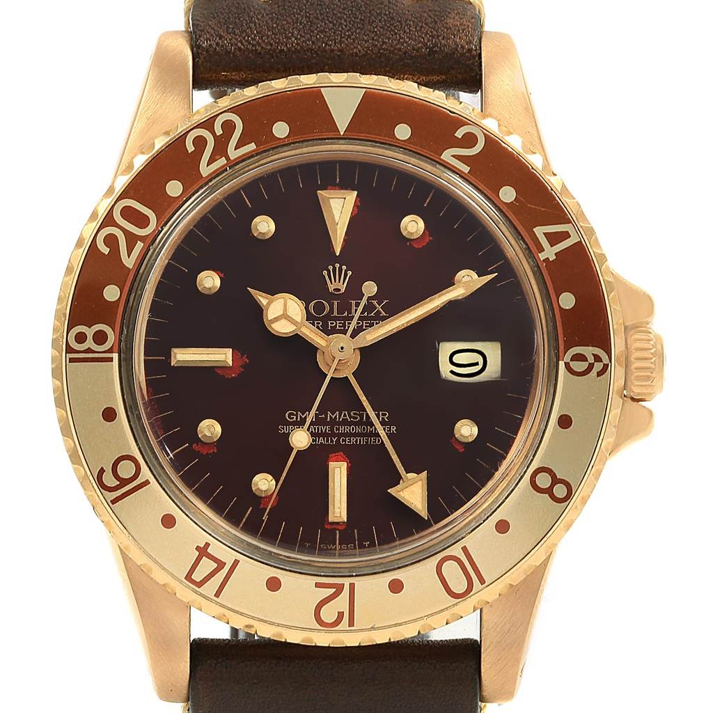 This image shows a front view of the Rolex Vintage Collection 1675 Men's Yellow Gold Brown Dial 1675 Men's Yellow Gold Brown Dial GMT-Master watch, displaying the dial, bezel, date window, and strap.