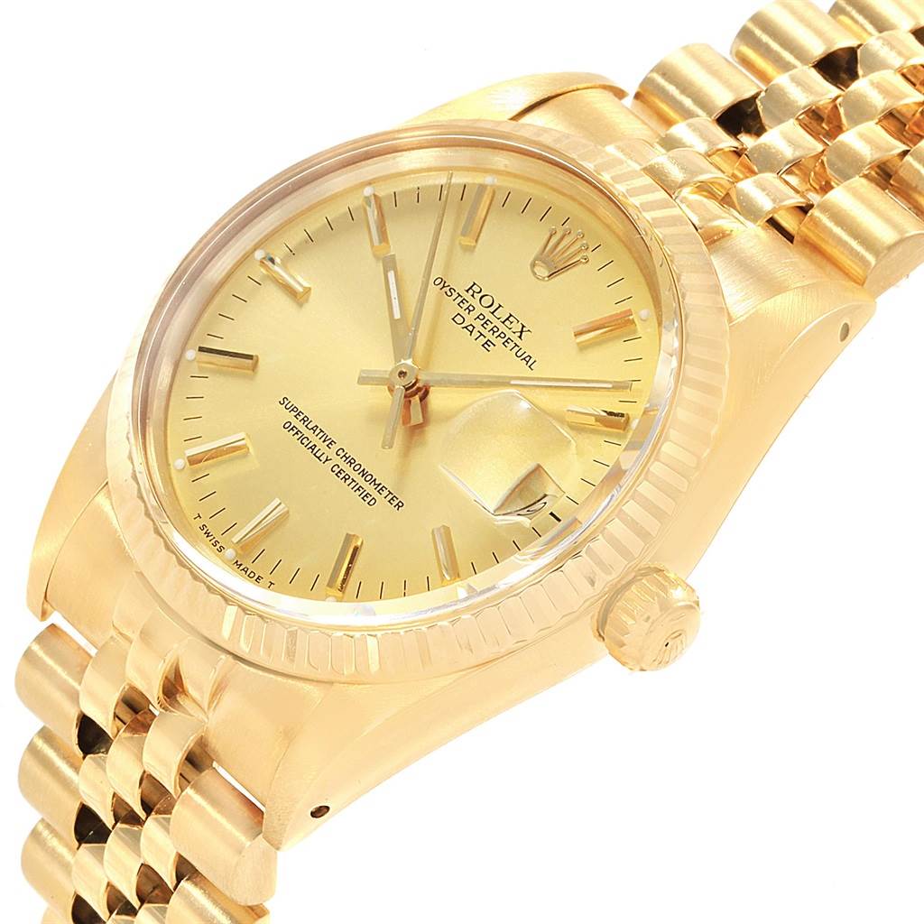 The image shows a close-up angle of a Vintage Collection Rolex watch, highlighting the dial, date window, crown, and bracelet.