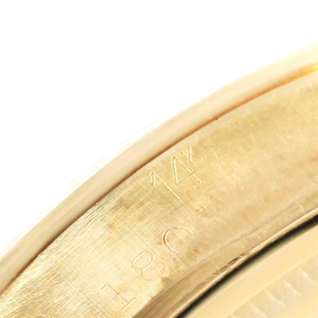 The image shows a close-up of the 14K gold casing detail on a Rolex Vintage Collection 1503 Men's Yellow Gold Silver Dial 1503 Men's Yellow Gold Silver Dial model watch.