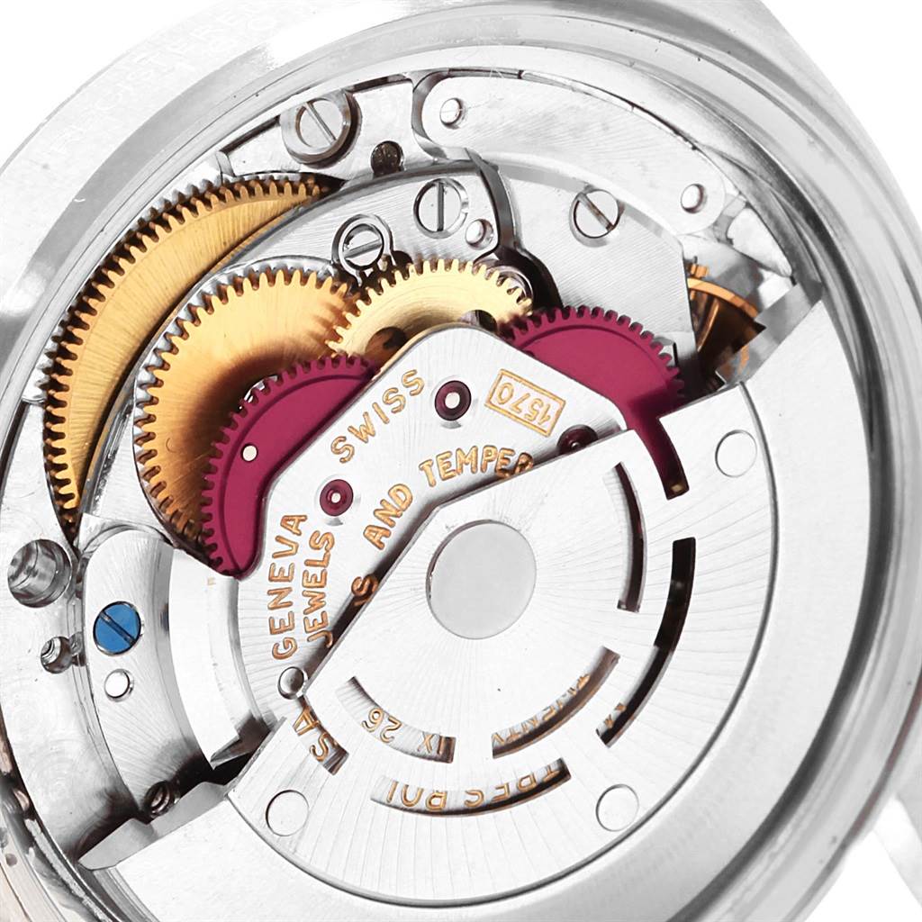 This image shows a close-up of the Rolex Vintage Collection 1601 Men's Stainless Steel Silver Dial 1601 Men's Stainless Steel Silver Dial watch movement and gears from a rear angle.
