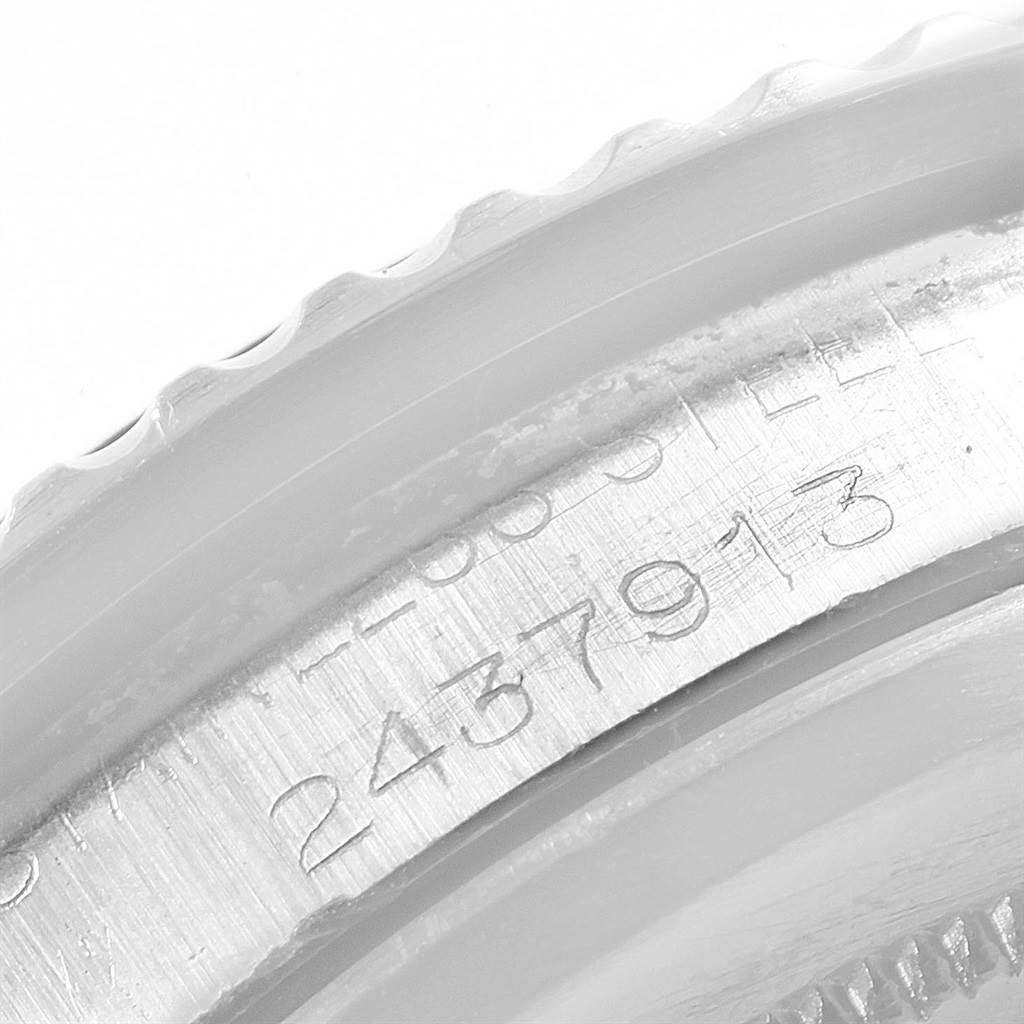 This is a close-up of the serial number engraved on the side of the Rolex Vintage Collection 1680 Men's Stainless Steel Black Dial 1680 Men's Stainless Steel Black Dial model watch case.