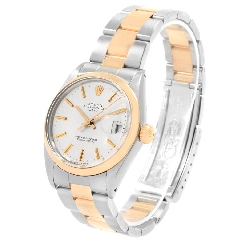 The Vintage Collection model by Rolex is shown at an angled view, highlighting its two-tone bracelet, dial, and crown.
