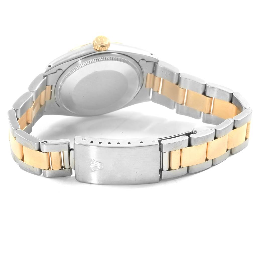 The image shows the back view of the Rolex Vintage Collection 1500 Men's Steel and Gold (two tone) Silver Dial 1500 Men's Steel and Gold (two tone) Silver Dial model watch, highlighting the bracelet, clasp, case back, and crown.