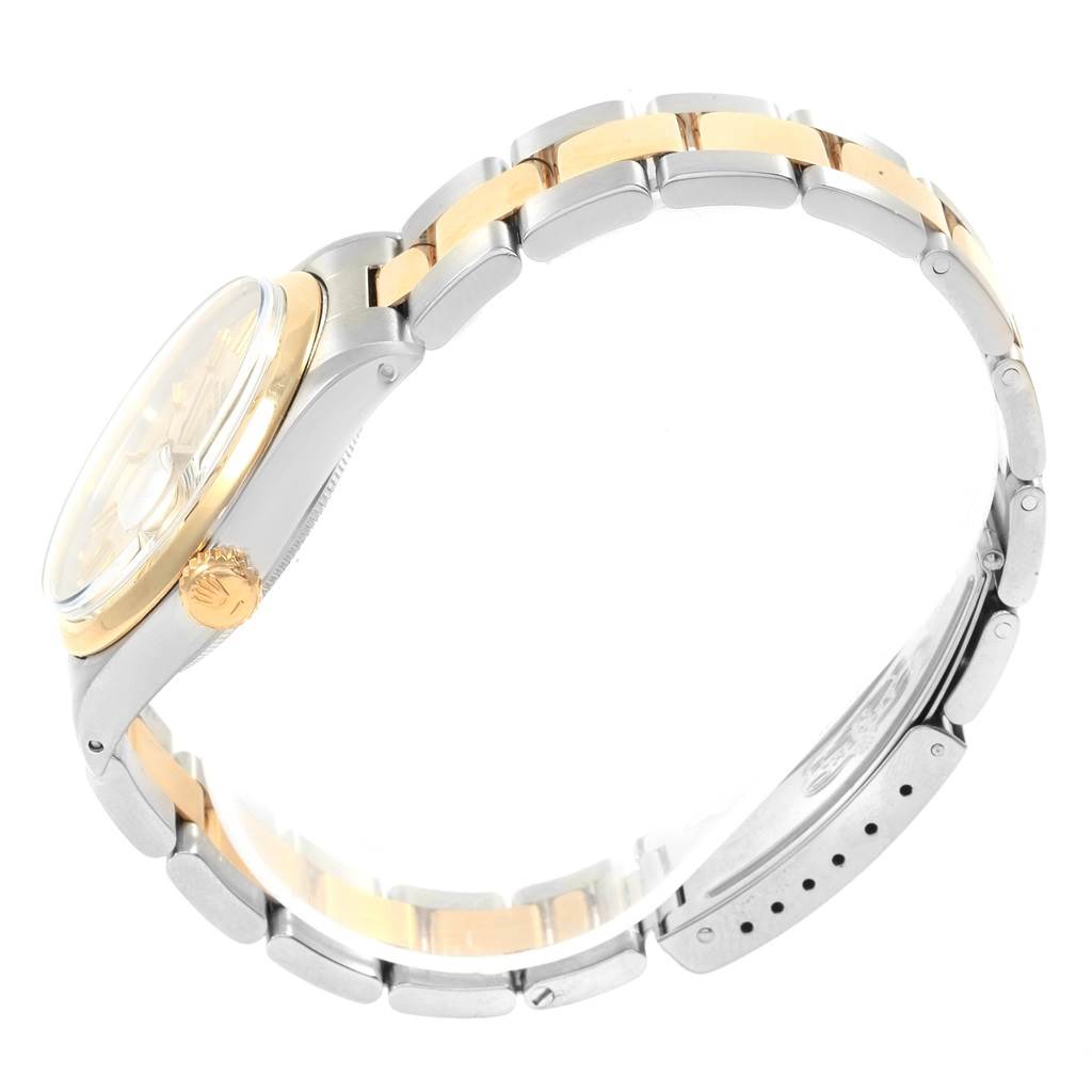 This image shows a side view of the Rolex Vintage Collection 1500 Men's Steel and Gold (two tone) Silver Dial 1500 Men's Steel and Gold (two tone) Silver Dial watch, highlighting the crown and two-tone metal bracelet.