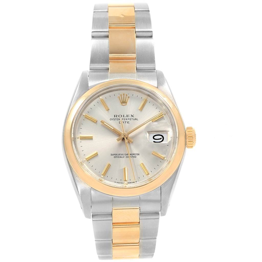 This Rolex Vintage Collection 1500 Men's Steel and Gold (two tone) Silver Dial 1500 Men's Steel and Gold (two tone) Silver Dial model watch is shown from a top-down angle, displaying the face, bezel, bracelet, and crown.
