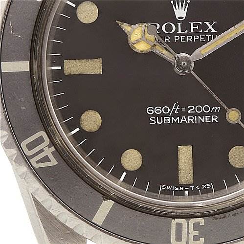 This image shows a close-up of the face and bezel of a Rolex Vintage Collection 5513 Men
s Stainless Steel Black Dial 5513 Men
s Stainless Steel Black Dial Submariner watch, highlighting the dial and markings.