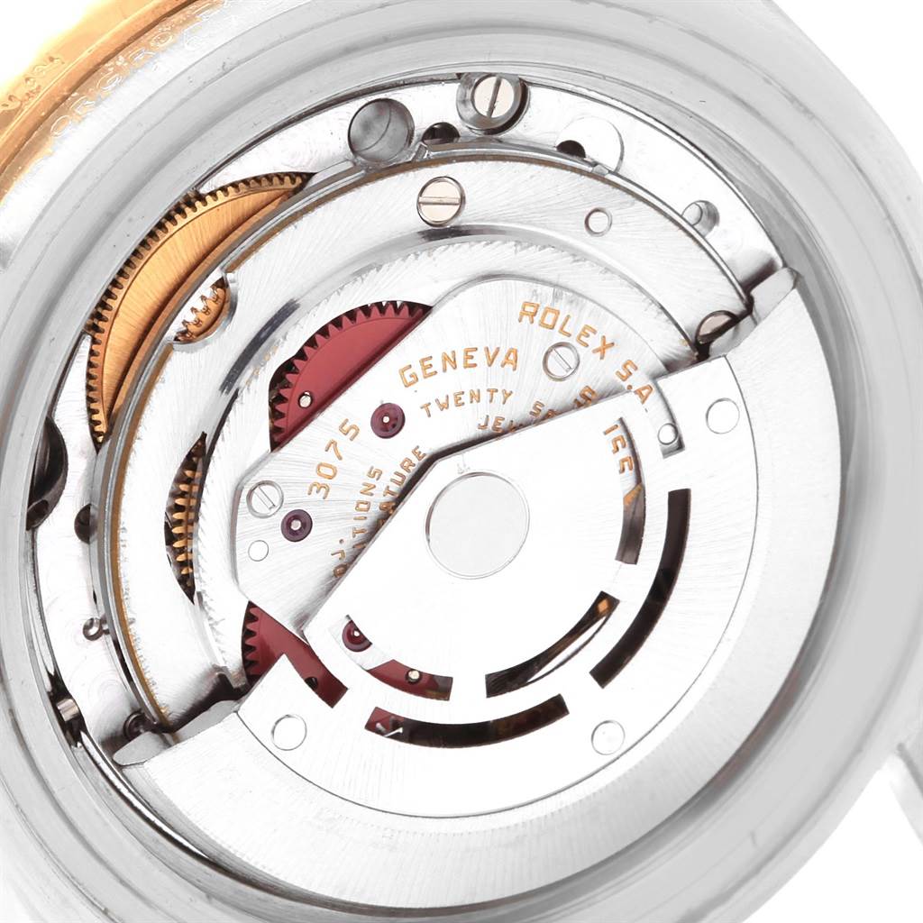 This close-up image shows the internal mechanical movement parts of a Rolex Vintage Collection 16753 Men's Stainless Steel Brown Dial 16753 Men's Stainless Steel Brown Dial model watch.
