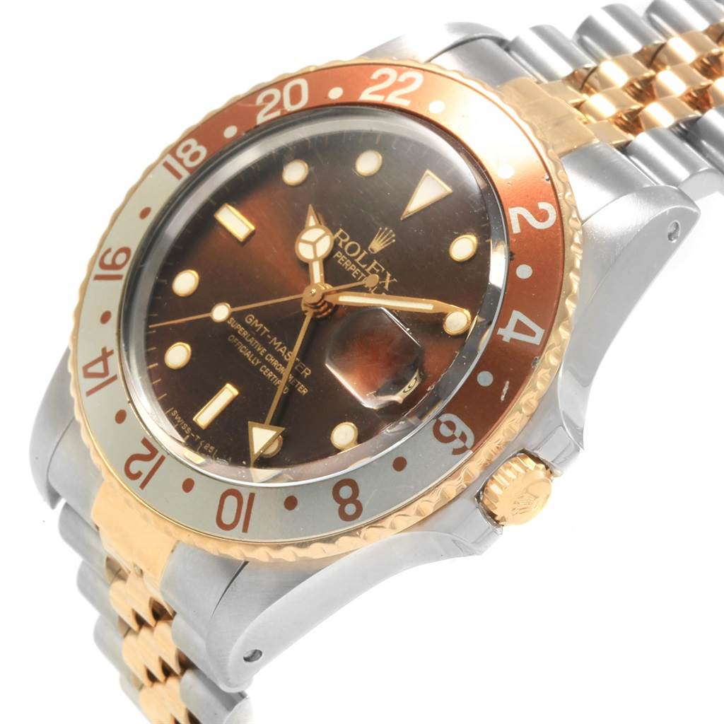 The image shows a side view of a Rolex Vintage Collection 16753 Men's Stainless Steel Brown Dial 16753 Men's Stainless Steel Brown Dial GMT-Master watch, highlighting the bezel, dial, crown, and strap links.