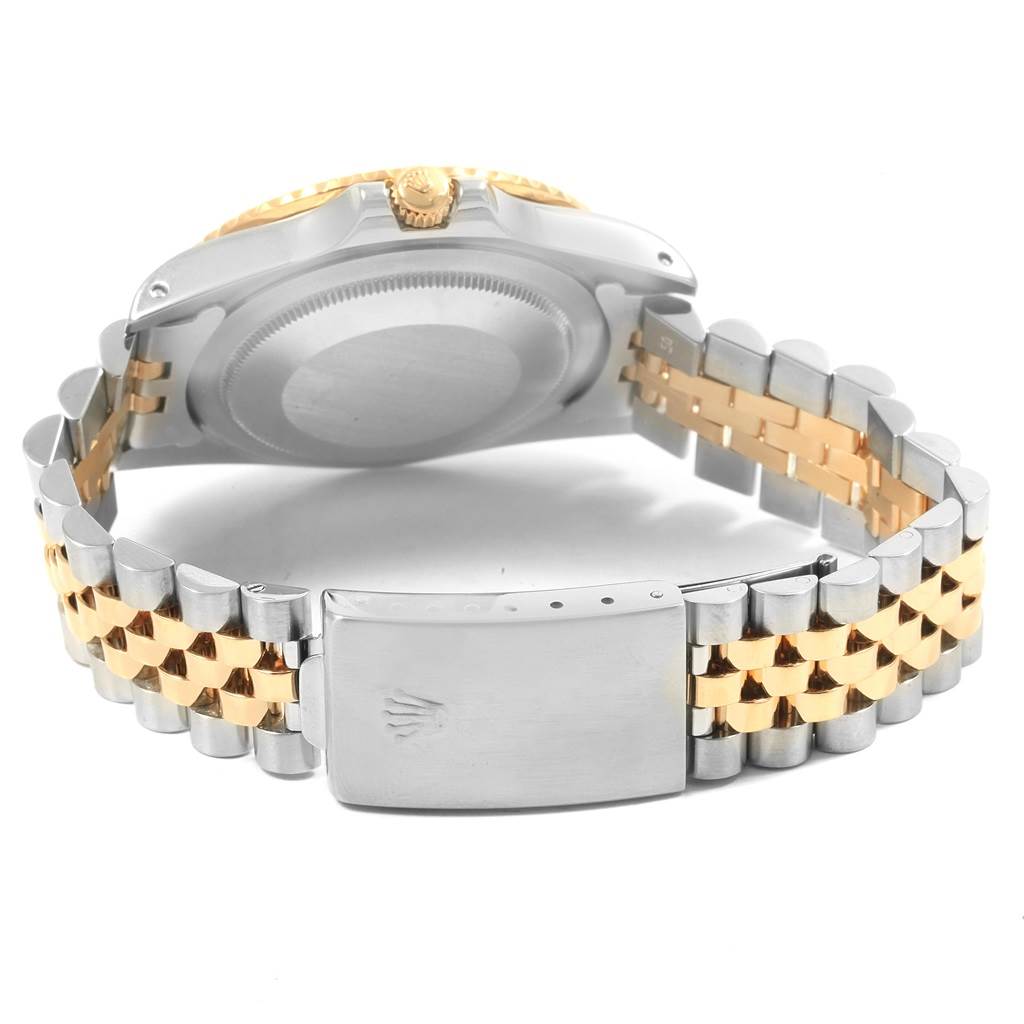 This image shows the back case and clasp area of a Rolex Vintage Collection 16753 Men's Stainless Steel Brown Dial 16753 Men's Stainless Steel Brown Dial watch, highlighting its two-tone metal band.