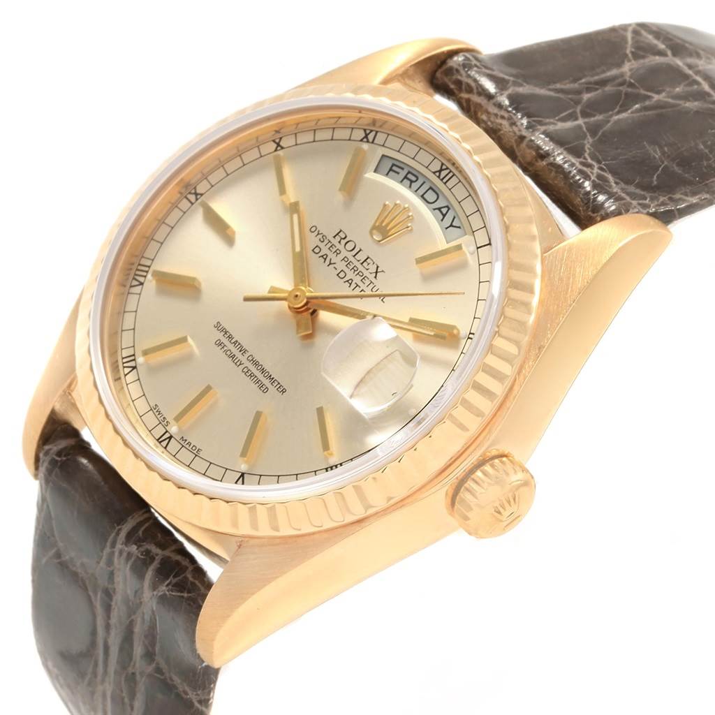 The Rolex Vintage Collection 18038 Men's Yellow Gold Silver Dial 18038 Men's Yellow Gold Silver Dial watch is shown at an angled close-up, highlighting the dial, bezel, crown, and strap.