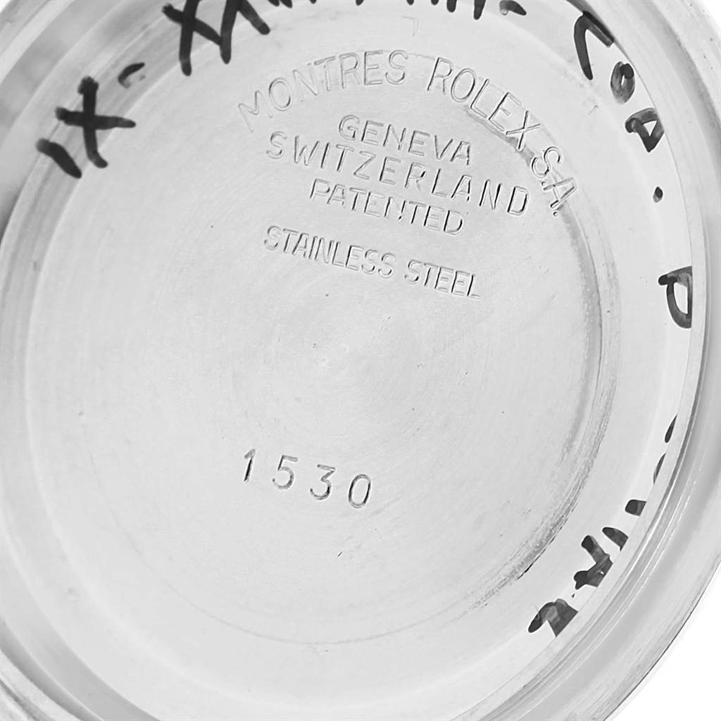 The image shows the inner case back of a Vintage Collection Rolex watch, engraved with model details and number 1530.