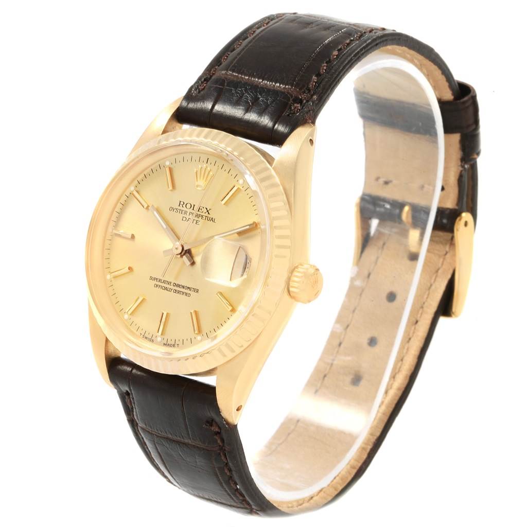 The image shows a side angle of the Rolex Vintage Collection 15037 Men
s Yellow Gold Champagne Dial 15037 Men
s Yellow Gold Champagne Dial watch, highlighting the face, crown, and leather strap.