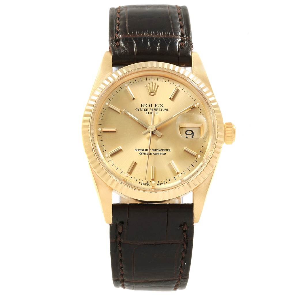 This image shows a front view of the Rolex Vintage Collection 15037 Men
s Yellow Gold Champagne Dial 15037 Men
s Yellow Gold Champagne Dial watch, highlighting its dial, bezel, and leather strap.