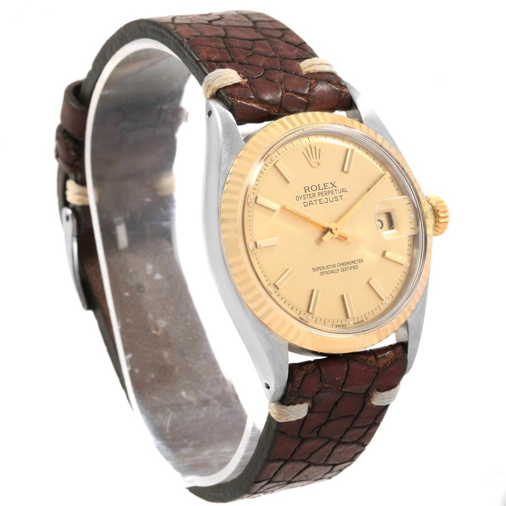 The Rolex Vintage Collection 1601 Men's Steel and Gold (two tone) Champagne Dial 1601 Men's Steel and Gold (two tone) Champagne Dial model is shown from a front-left angle, highlighting its dial, bezel, crown, and leather strap.