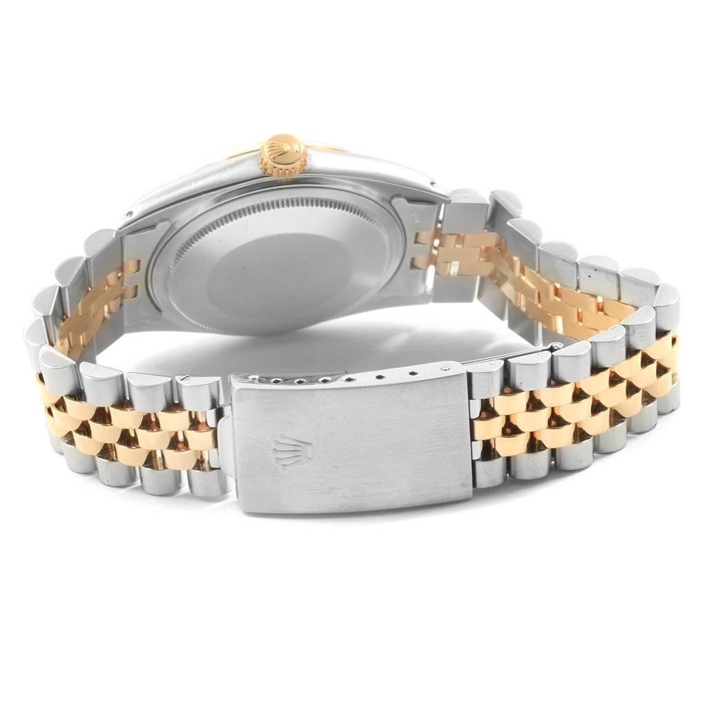 The image shows the back of a Rolex Vintage Collection 16013 Men's Stainless Steel Black Dial 16013 Men's Stainless Steel Black Dial watch, highlighting the case back, crown, and two-tone bracelet with clasp.