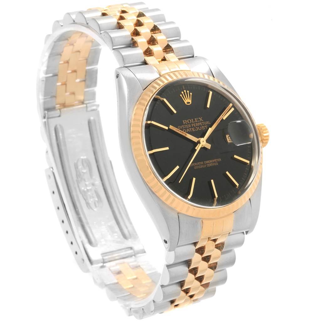 The image shows a Rolex Vintage Collection 16013 Men's Stainless Steel Black Dial 16013 Men's Stainless Steel Black Dial watch at a slight angle, highlighting its black dial, mixed metal band, and gold bezel.