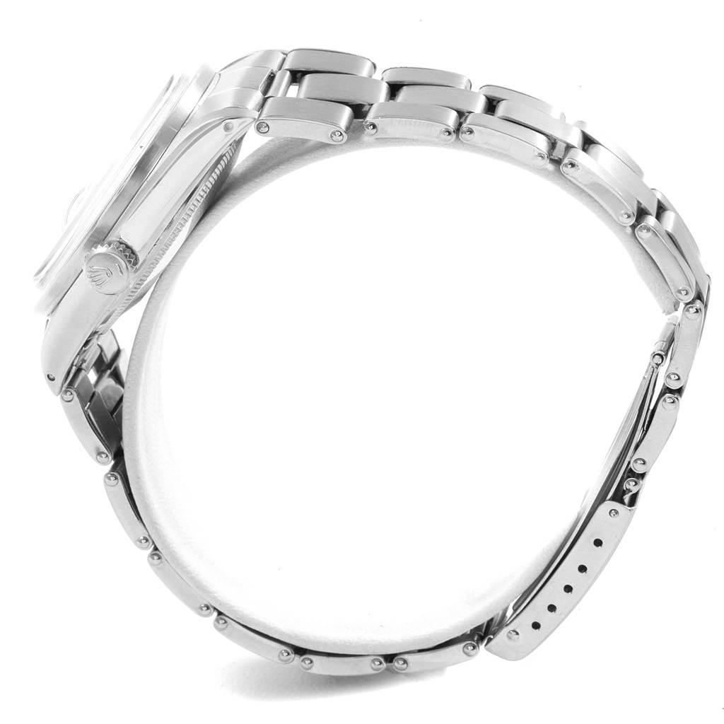 The image shows a side view of a Vintage Collection Rolex watch, highlighting its case, crown, and bracelet.