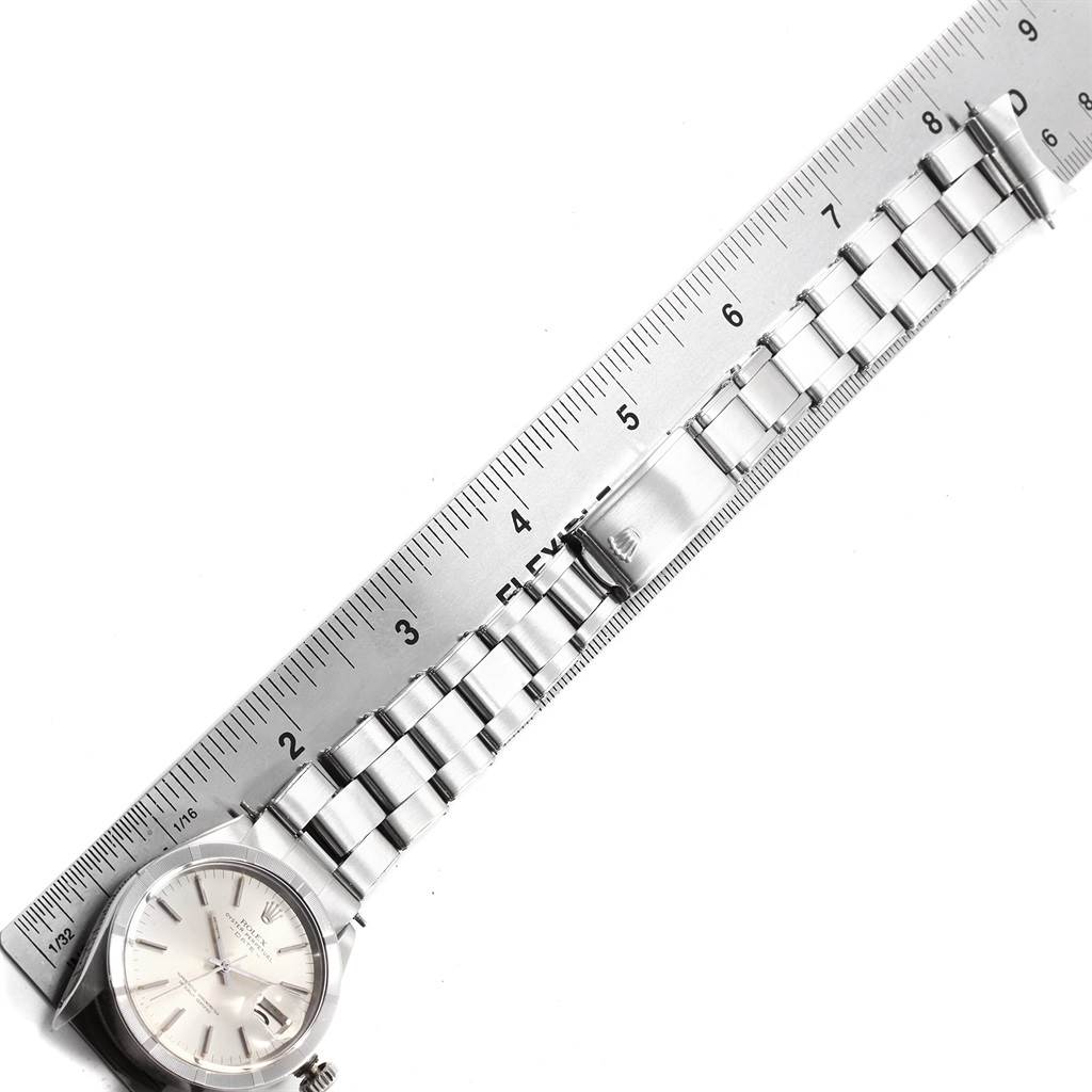 The image shows a side view of a Vintage Collection model by Rolex, featuring the watch face and metal bracelet measured against a ruler.