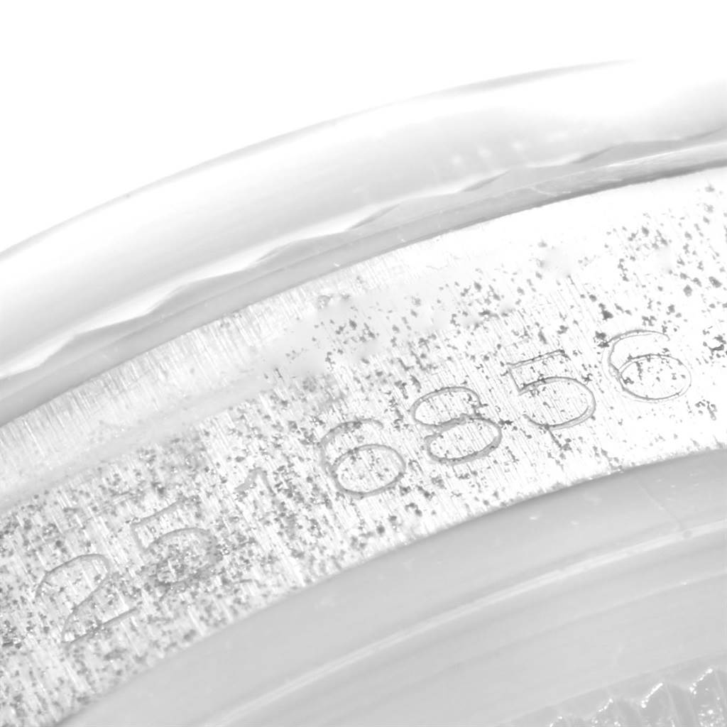 The image shows a close-up angle of the serial or reference number engraved on the case of the Rolex Vintage Collection 1603 Men's Stainless Steel Silver Dial 1603 Men's Stainless Steel Silver Dial model watch.