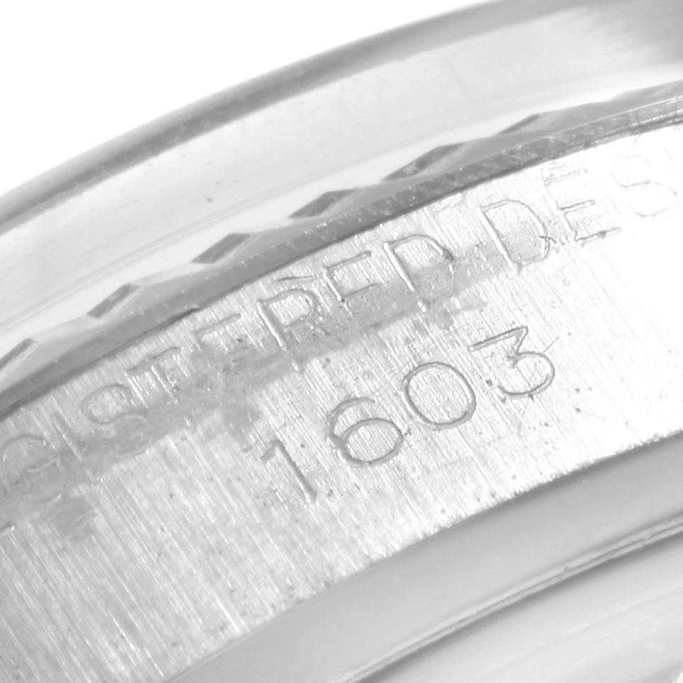 The image shows a close-up angle of the case's inner rim with model engraving on the Rolex Vintage Collection 1603 Men's Stainless Steel Silver Dial 1603 Men's Stainless Steel Silver Dial watch.