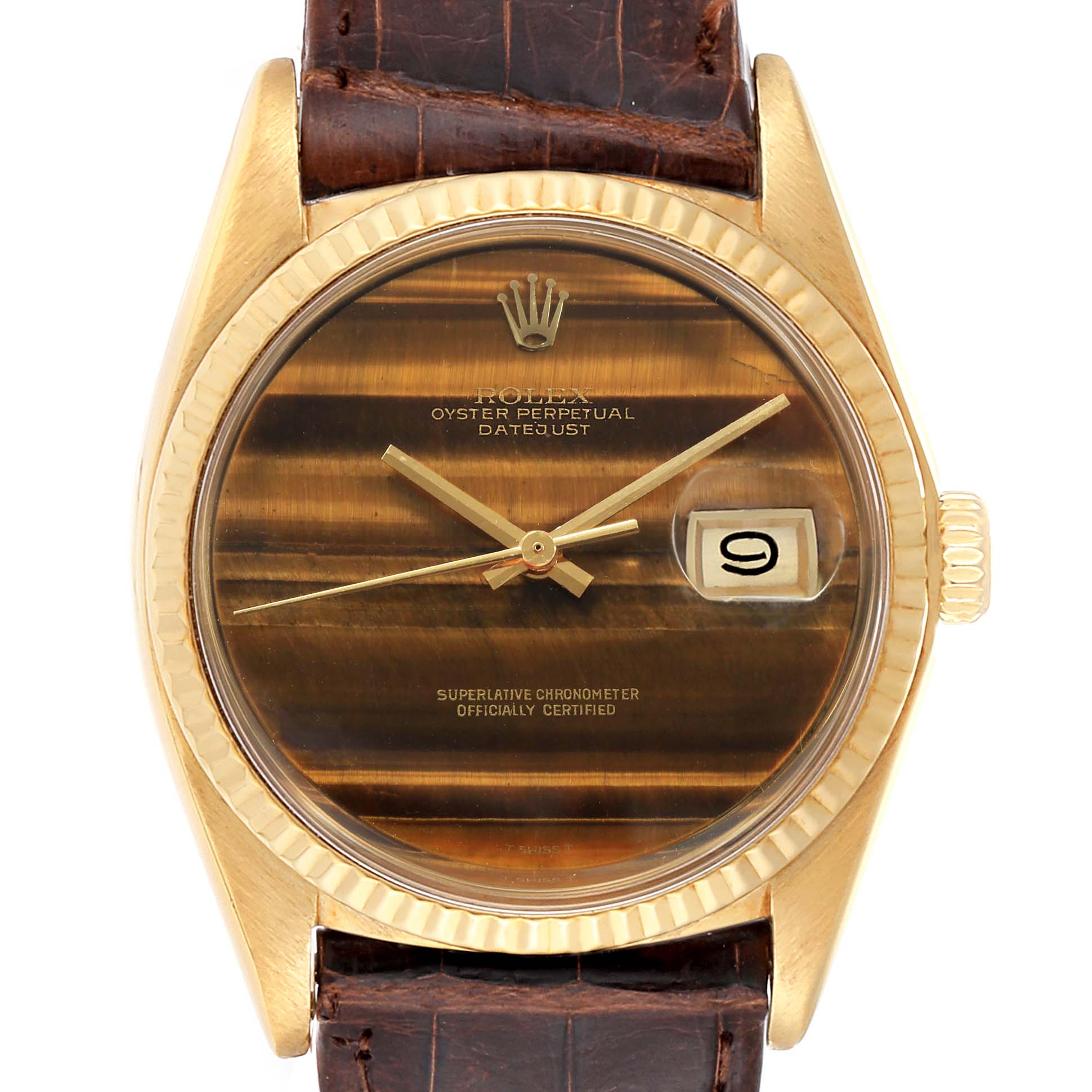 This image shows a frontal view of the Rolex Vintage Collection 1601 Men
s Yellow Gold Brown Dial 1601 Men
s Yellow Gold Brown Dial Datejust watch, highlighting its face, crown, and part of the brown leather strap.