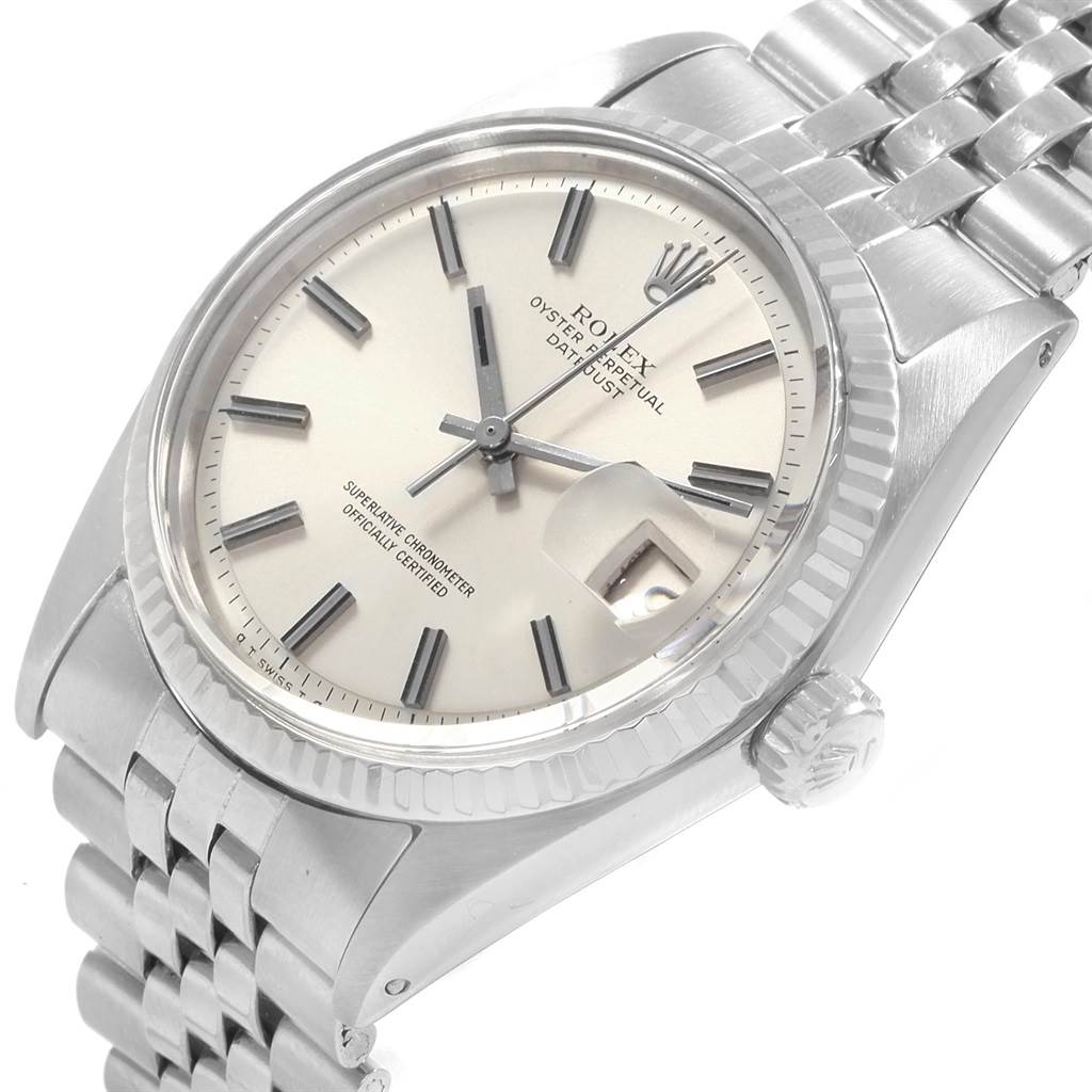 This image shows a Rolex Vintage Collection 1601 Men's Stainless Steel Silver Dial 1601 Men's Stainless Steel Silver Dial watch at an angled side view, highlighting its dial, bezel, crown, and bracelet.