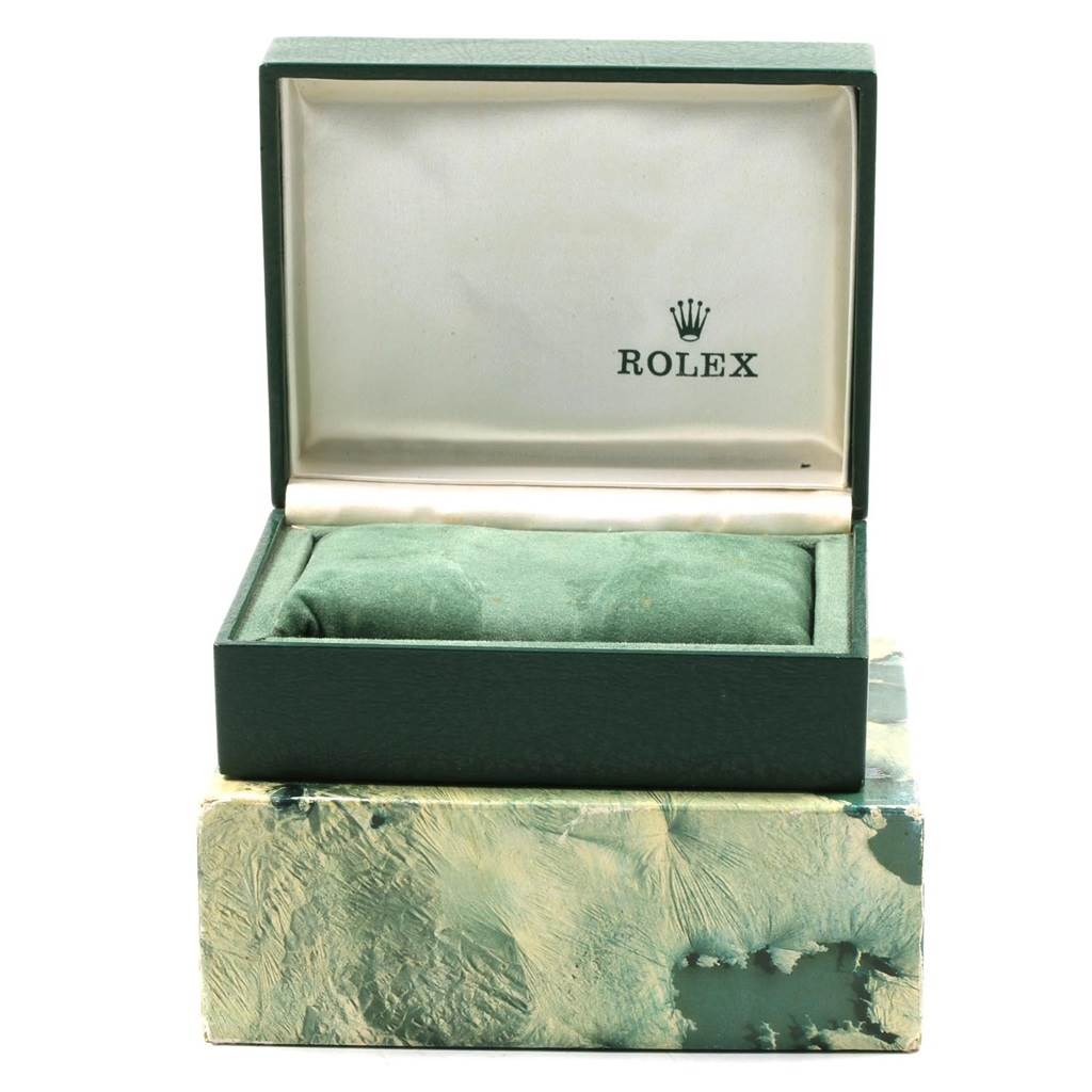 The image shows a Rolex Vintage Collection 1505 Men's Steel and Gold (two tone) Champagne Dial 1505 Men's Steel and Gold (two tone) Champagne Dial watch box, open at a front angle, revealing the inner cushion and the Rolex logo.