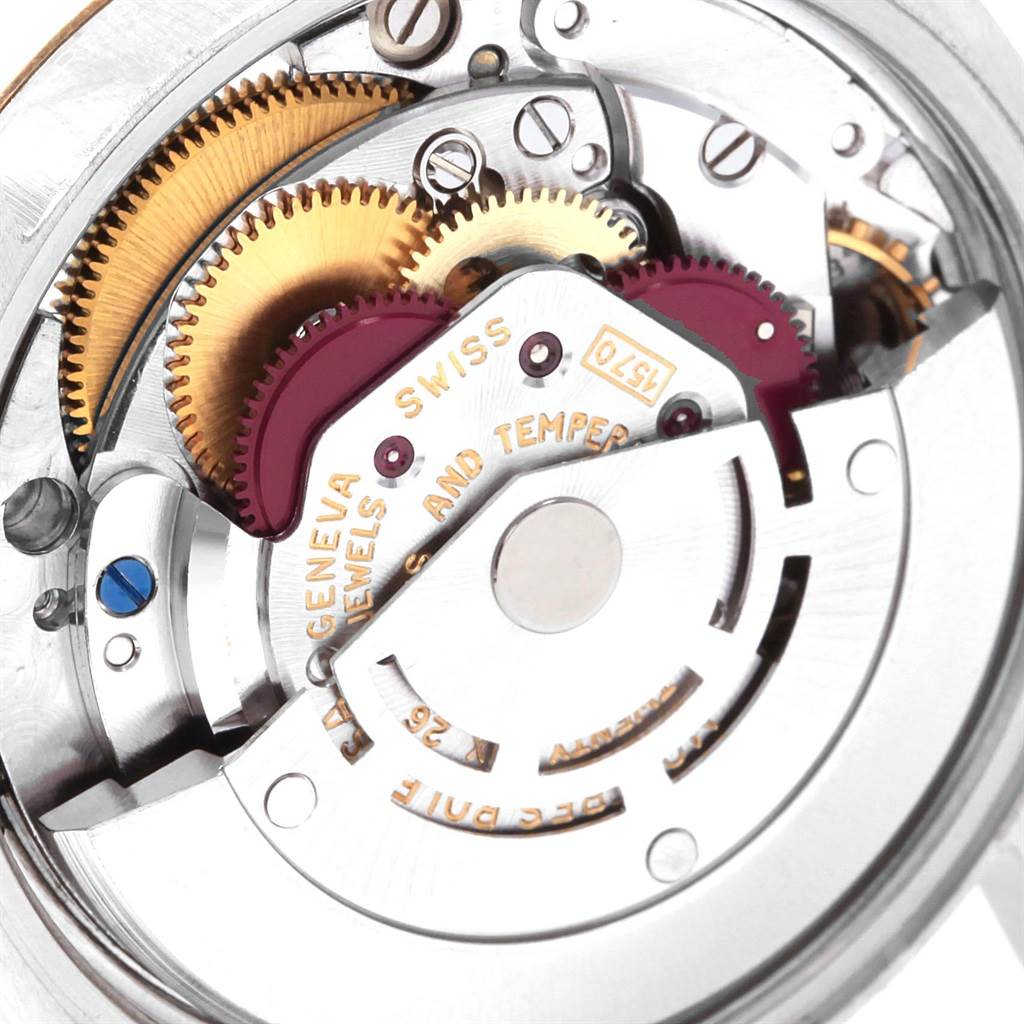This is a close-up view of the watch movement and internal gears of the Rolex Vintage Collection 1505 Men's Steel and Gold (two tone) Champagne Dial 1505 Men's Steel and Gold (two tone) Champagne Dial model.