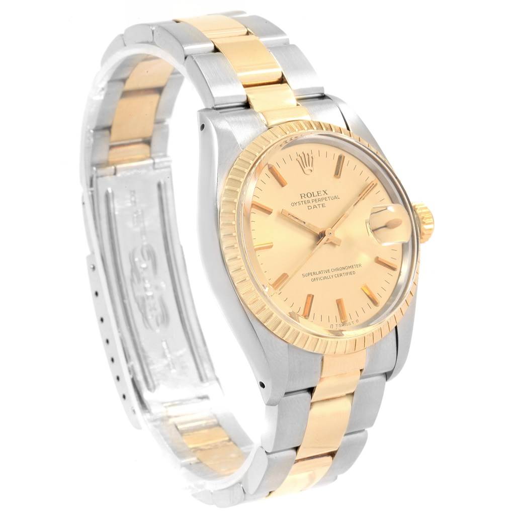 The Vintage Collection Rolex watch is shown at an angled side view, revealing the face, bezel, and partially open two-tone bracelet.
