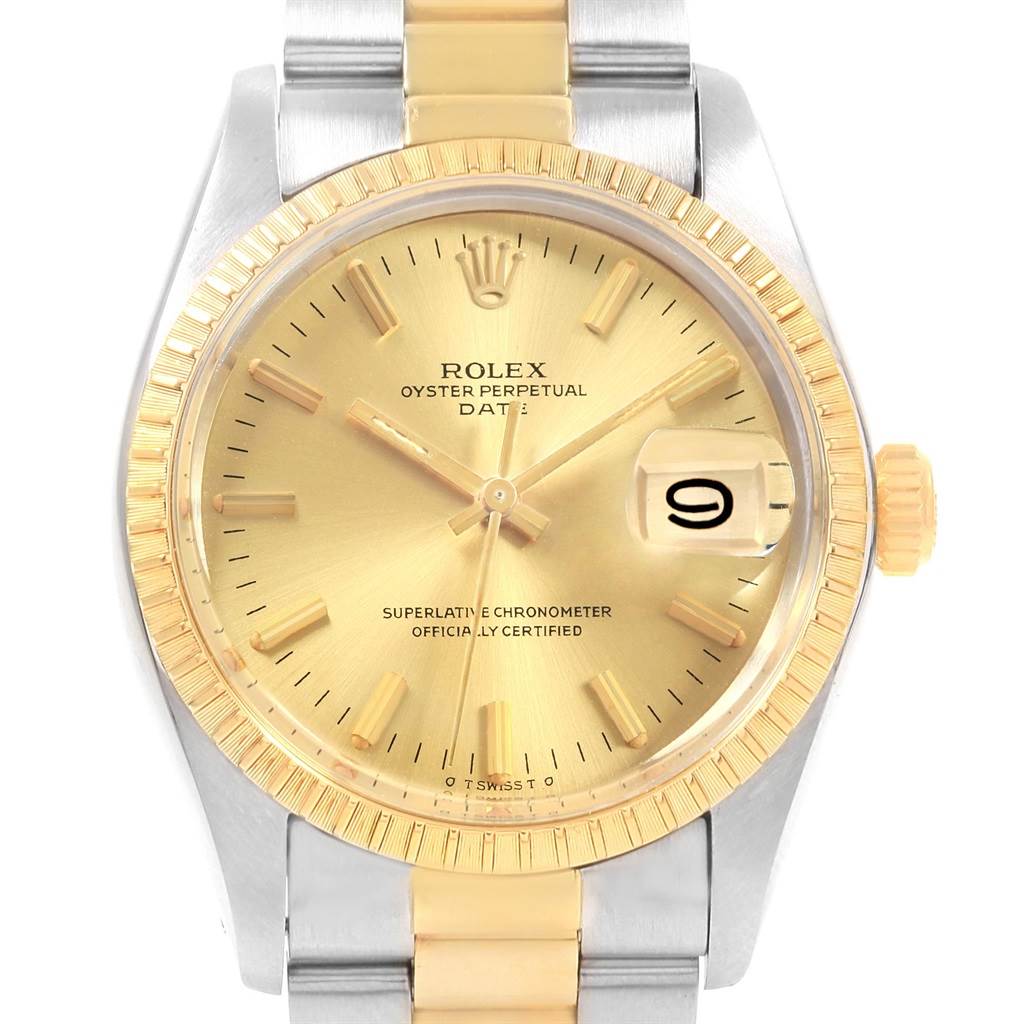 The image shows a frontal view of the Rolex Vintage Collection 1505 Men's Steel and Gold (two tone) Champagne Dial 1505 Men's Steel and Gold (two tone) Champagne Dial Oyster Perpetual Date watch, highlighting its gold dial, bezel, and two-tone bracelet.