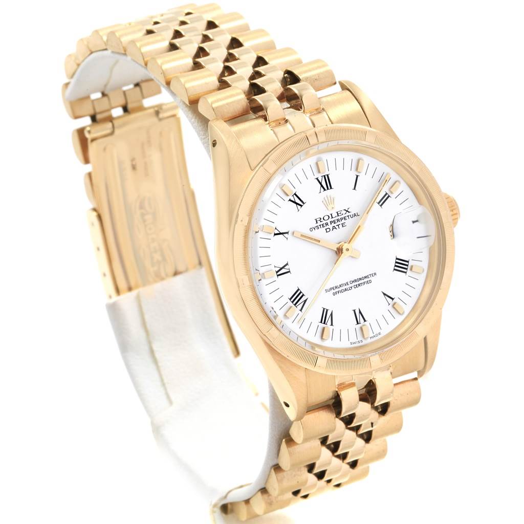 The Rolex Vintage Collection 15017 Men's Yellow Gold White Dial 15017 Men's Yellow Gold White Dial watch is shown at a three-quarter angle displaying its face, bezel, gold bracelet, and partially open clasp.