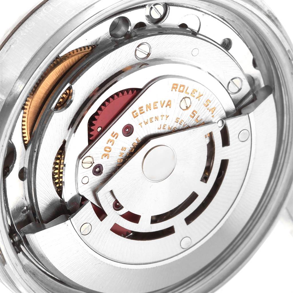 The image shows the intricate inner mechanism of the Rolex Vintage Collection 16030 Men
s Stainless Steel White Dial 16030 Men
s Stainless Steel White Dial, highlighting gears and the balance wheel from a rear perspective.