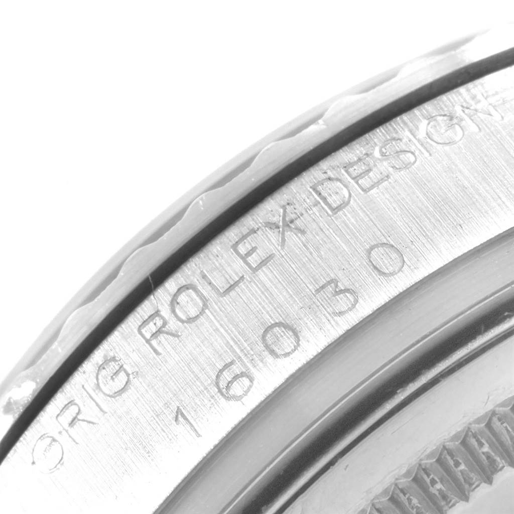 The image shows a close-up of the case back edge with the engraved model number of the Rolex Vintage Collection 16030 Men
s Stainless Steel White Dial 16030 Men
s Stainless Steel White Dial watch.