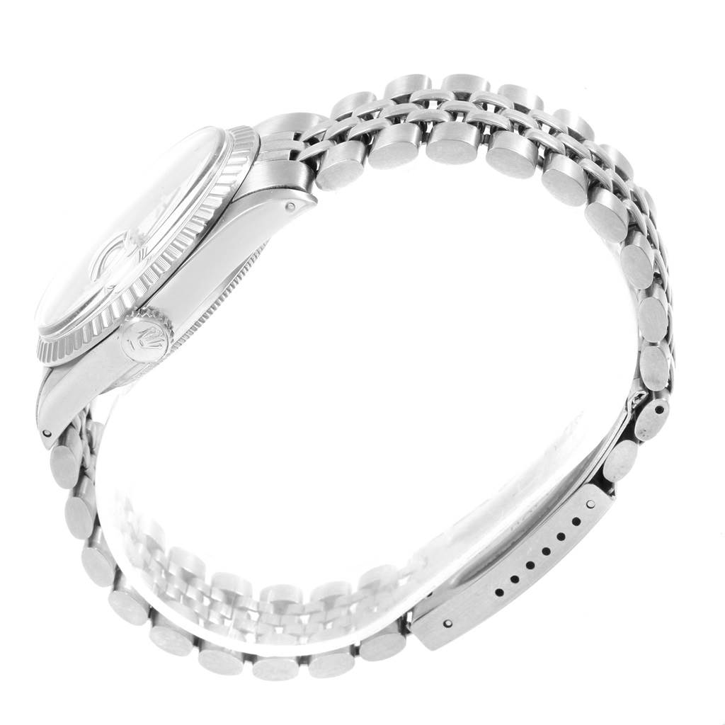 The image shows a side view of the Rolex Vintage Collection 16030 Men
s Stainless Steel White Dial 16030 Men
s Stainless Steel White Dial watch, highlighting the case, bezel, crown, and bracelet.