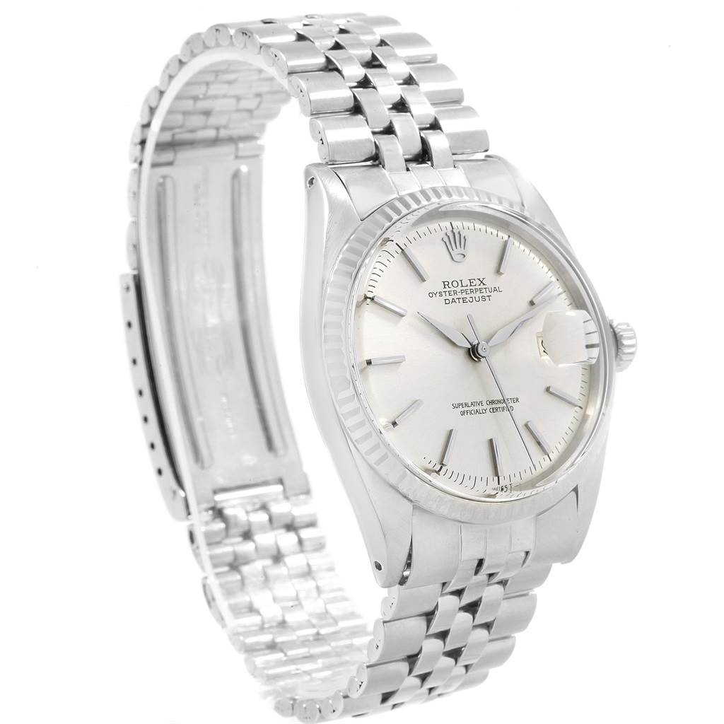The image shows a side angle view of the Rolex Vintage Collection 1601 Men's Stainless Steel Silver Dial 1601 Men's Stainless Steel Silver Dial watch, highlighting its face, bezel, crown, and bracelet.
