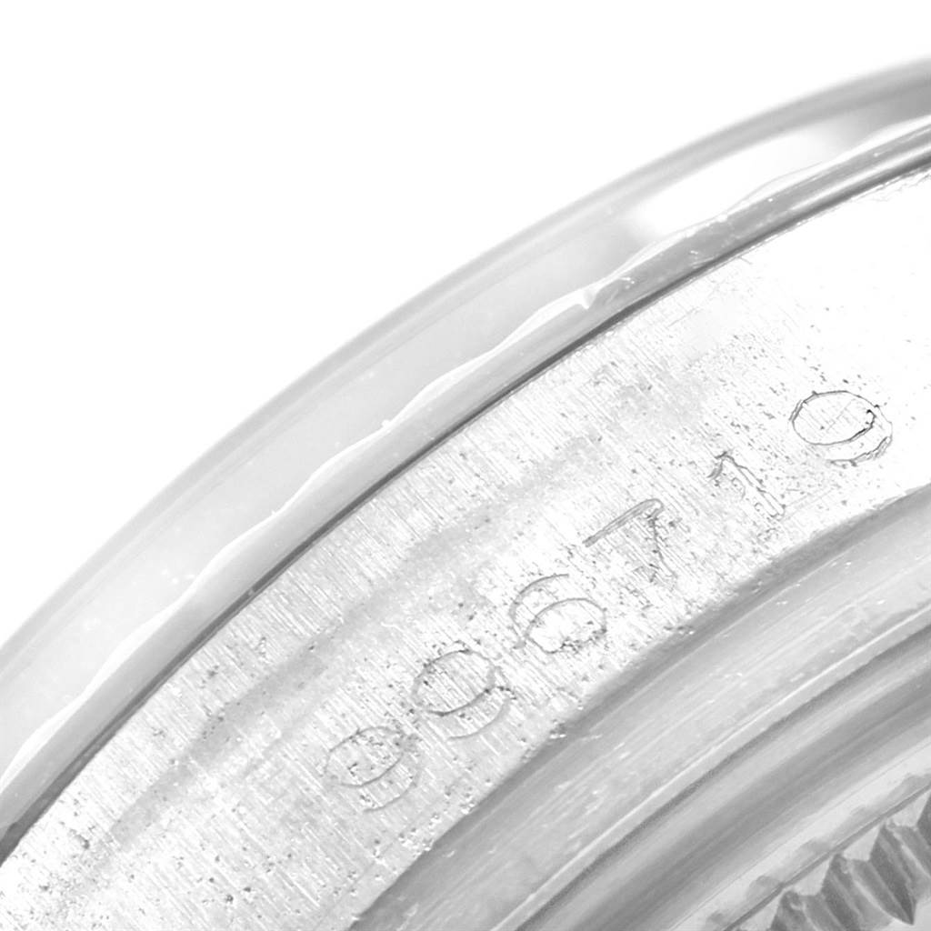 This image shows a close-up of the bezel and serial number of the Vintage Collection Rolex watch.