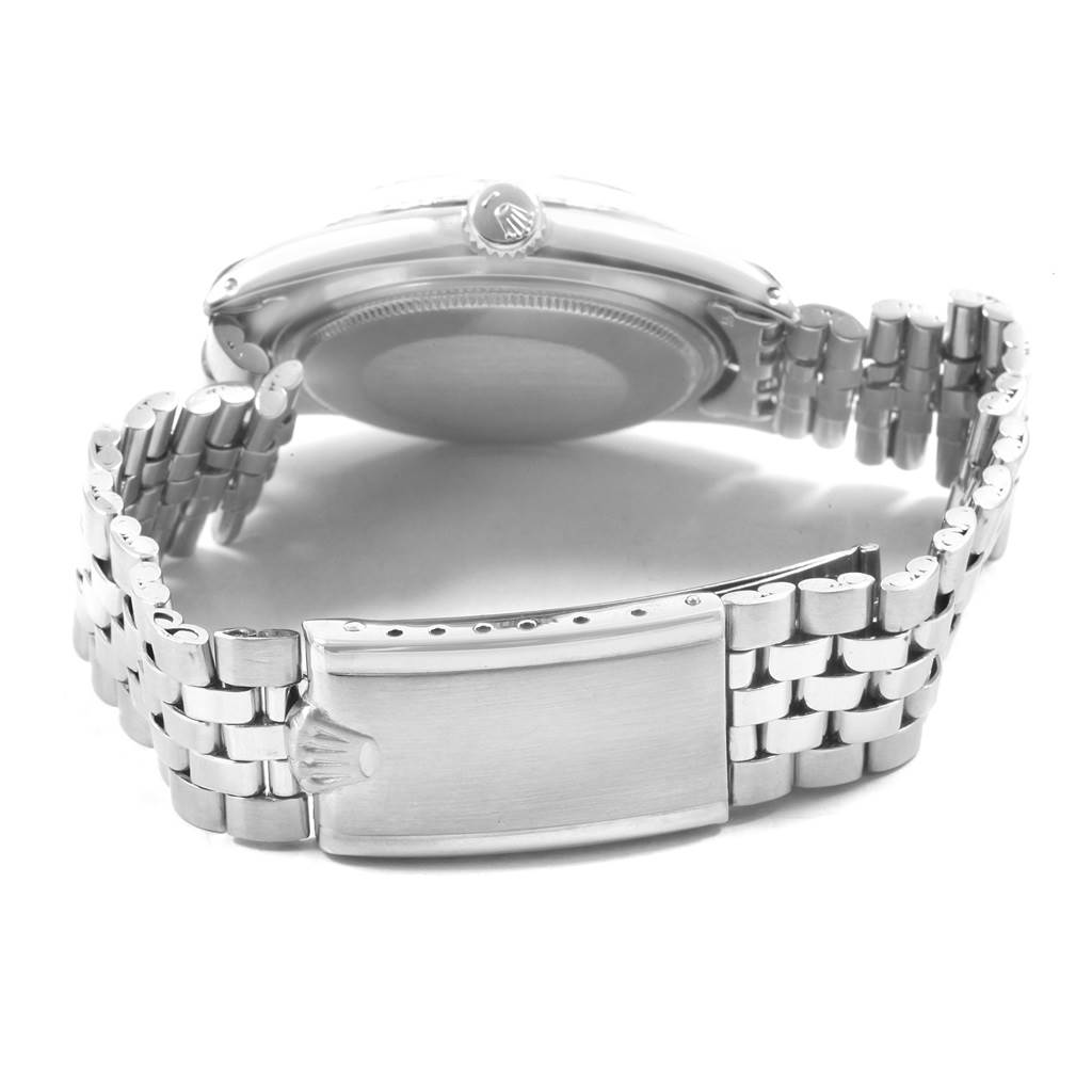 The image shows the back case, winding crown, and bracelet clasp of the Rolex Vintage Collection 1601 Men's Stainless Steel Silver Dial 1601 Men's Stainless Steel Silver Dial watch from a close-up angle.