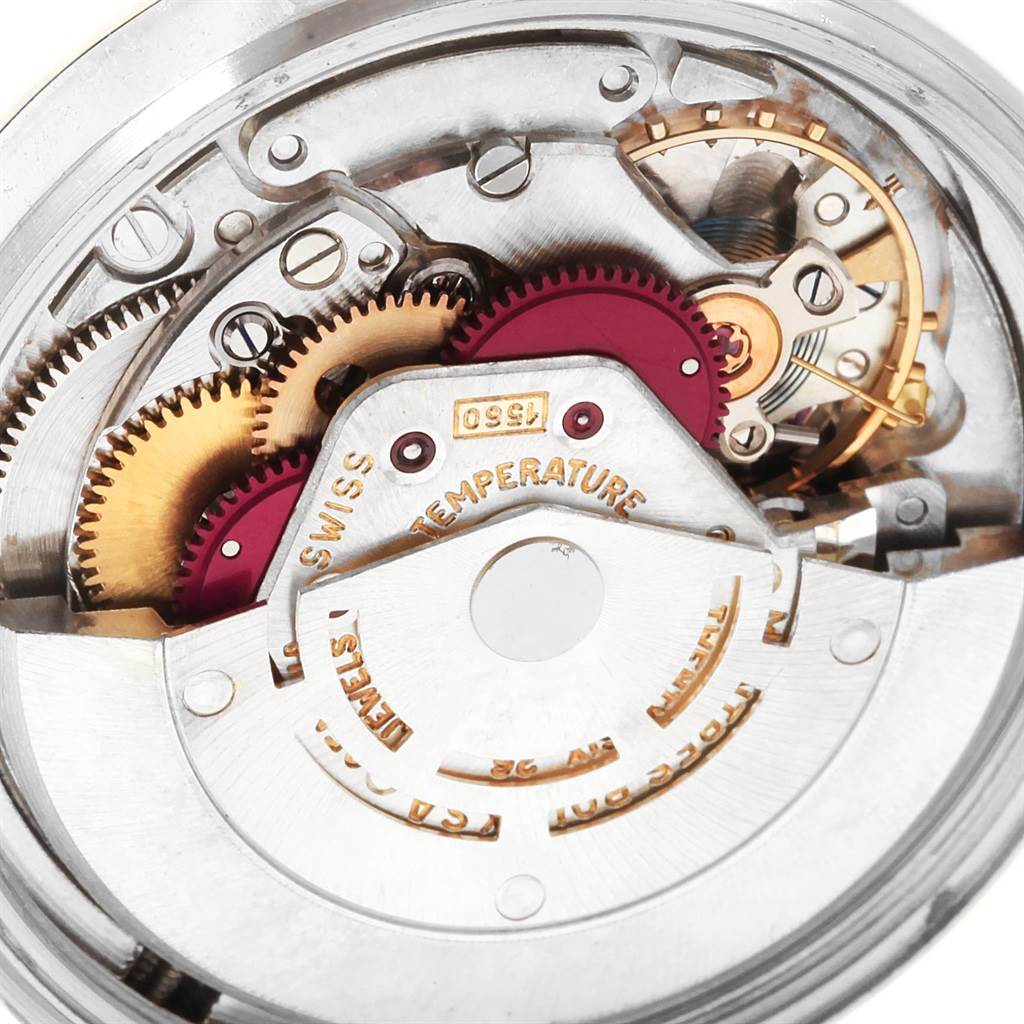 The image shows the intricate internal mechanics of the Rolex Vintage Collection 1601 Men's Stainless Steel Silver Dial 1601 Men's Stainless Steel Silver Dial watch, viewed from a close-up angle.