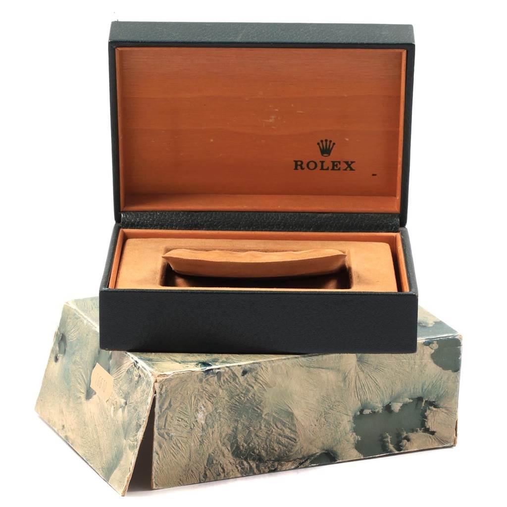 The image shows the open box for the Vintage Collection model by Rolex, revealing the cushion inside.