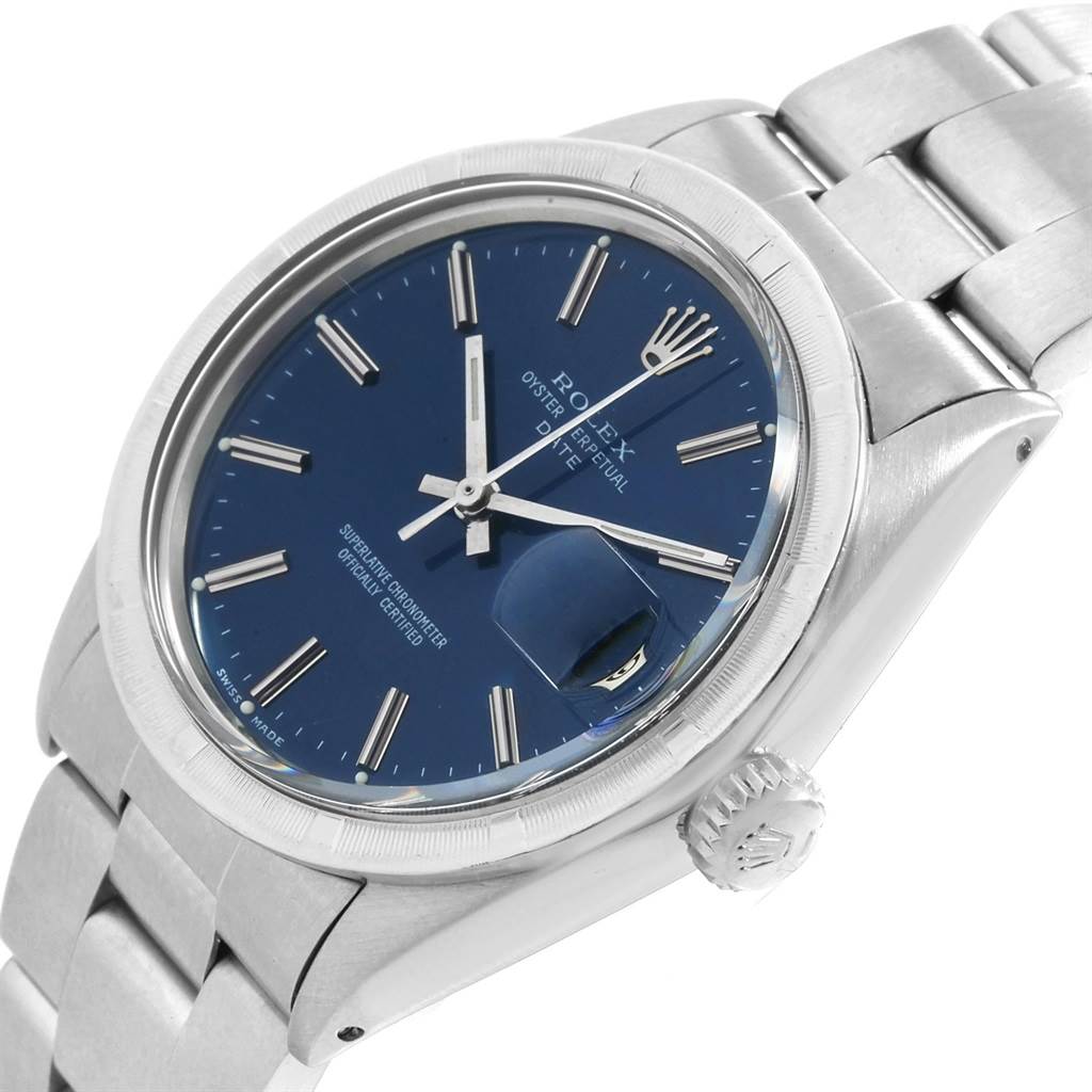 The image shows a Rolex Vintage Collection 1501 Men
s Stainless Steel Blue Dial 1501 Men
s Stainless Steel Blue Dial Oyster Perpetual Date watch at a slight angle, highlighting its dial, bezel, crown, and bracelet.