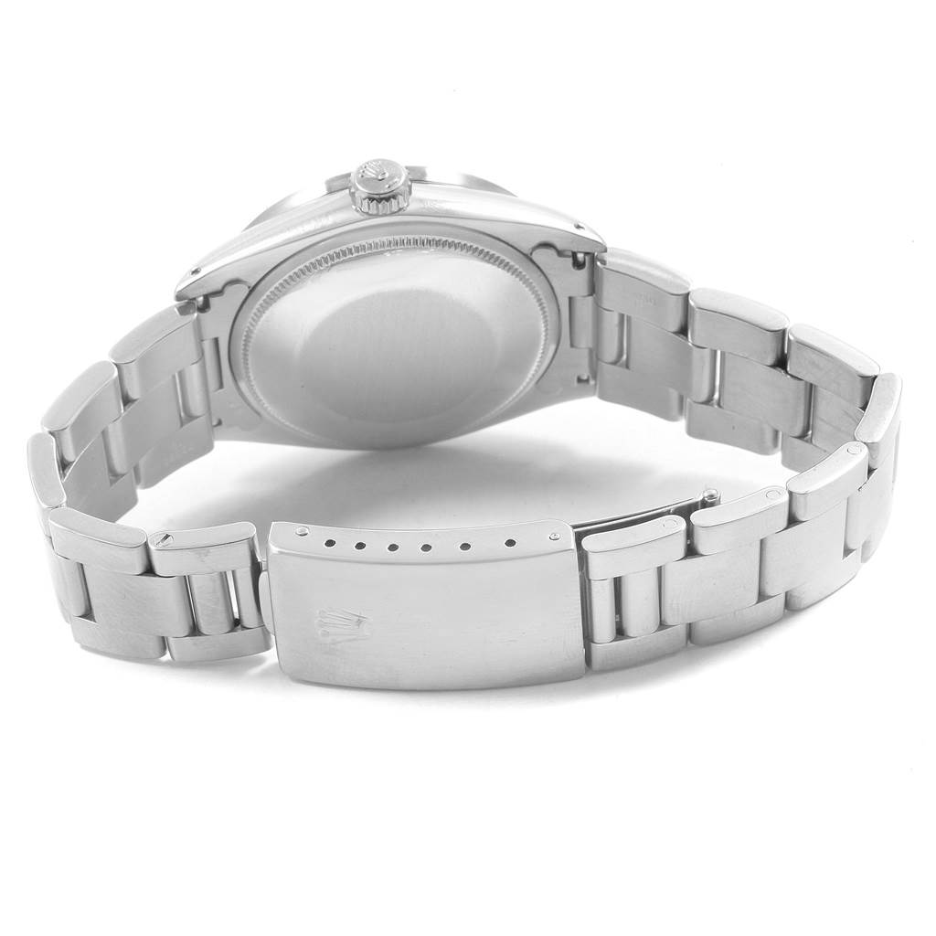 This image shows the back case, bracelet, and clasp of a Rolex Vintage Collection 1501 Men
s Stainless Steel Blue Dial 1501 Men
s Stainless Steel Blue Dial model watch.