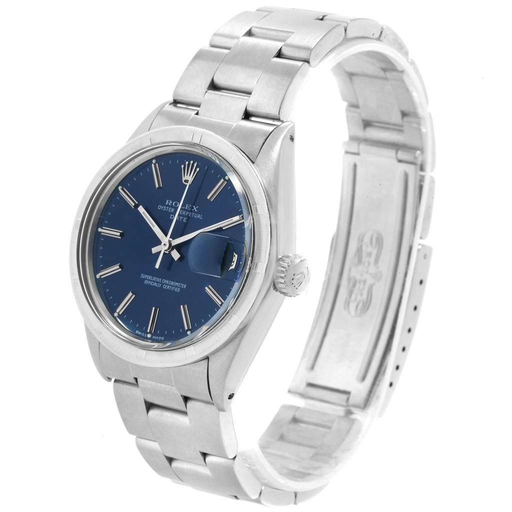 The image shows a Rolex Vintage Collection 1501 Men
s Stainless Steel Blue Dial 1501 Men
s Stainless Steel Blue Dial watch at an angle highlighting the face, crown, and part of the bracelet.