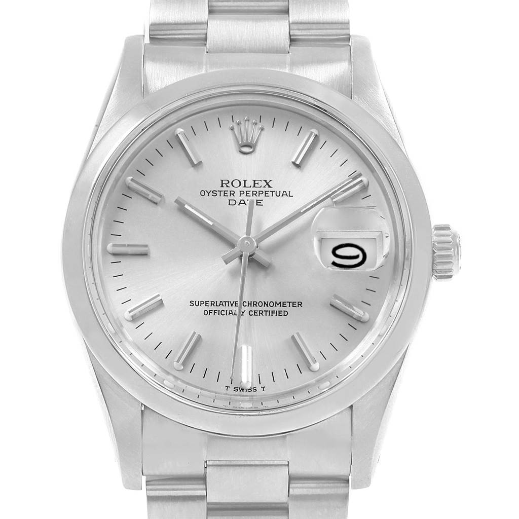 The image shows a frontal view of the Rolex Oyster Perpetual Date watch from the Vintage Collection, highlighting its dial, hands, and bracelet.