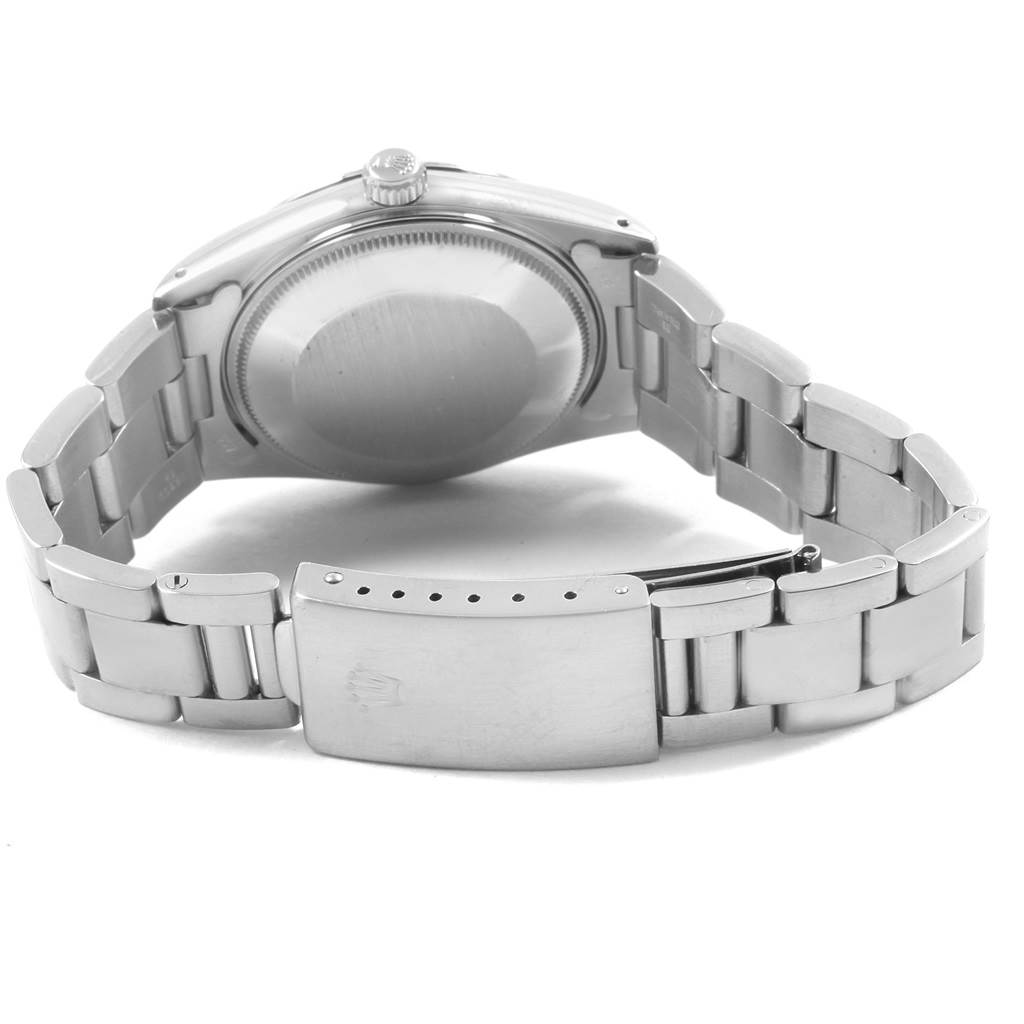 The image shows the back view of a Rolex Vintage Collection 15000 Men's Stainless Steel Silver Dial 15000 Men's Stainless Steel Silver Dial watch, focusing on the case back and metal bracelet.