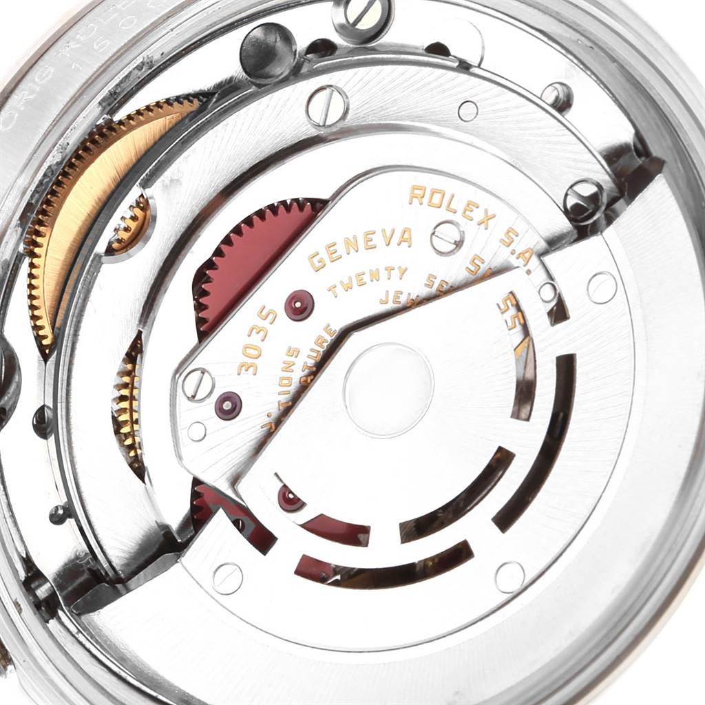 This image shows the inner mechanism of a Vintage Collection model by Rolex, highlighting gears and the rotor.